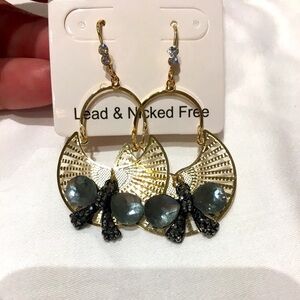 Earrings butterflies and gold tone setting!